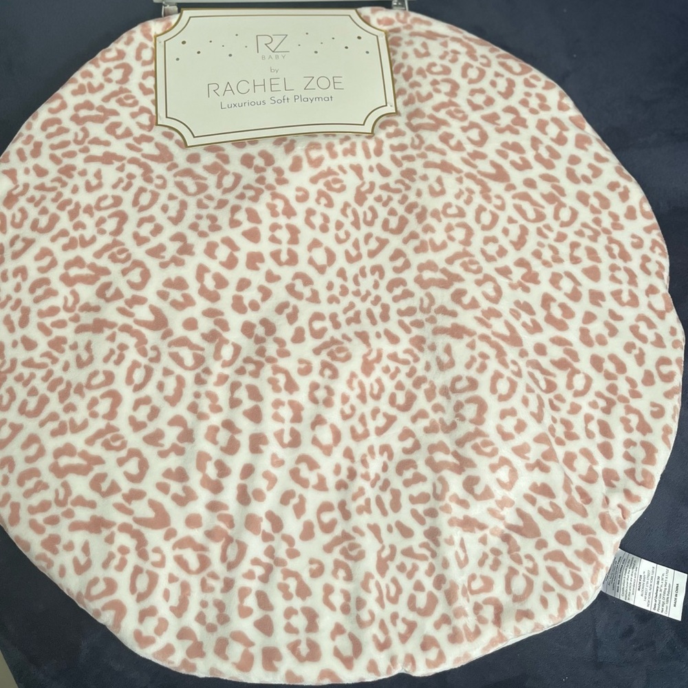 79# NWT Rachel Zoe Reversible Pink and White Animal Print Playmat